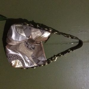 Coach gold tone purse